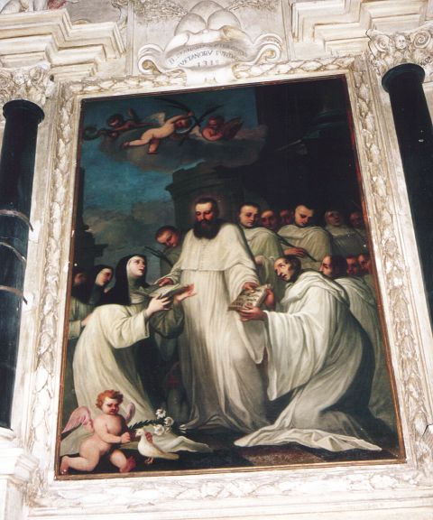 Particolare all'interno della chiesa di S. Pietro e Paolo: altare di San Bernardo Tolomei, fondatore degli Olivetani: tela raffigurante San  Benedetto che d la regola al Santo.